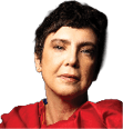 A person with short dark hair wearing a red garment is shown against a black background with yellow text indicating a date and location. Description generated by AI