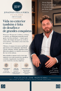 A person with styled hair and a beard wearing a dark suit sits confidently in an office setting next to a text advertisement for a psychologist specializing in supporting people living abroad with emotional health and life challenges. Description generated by AI